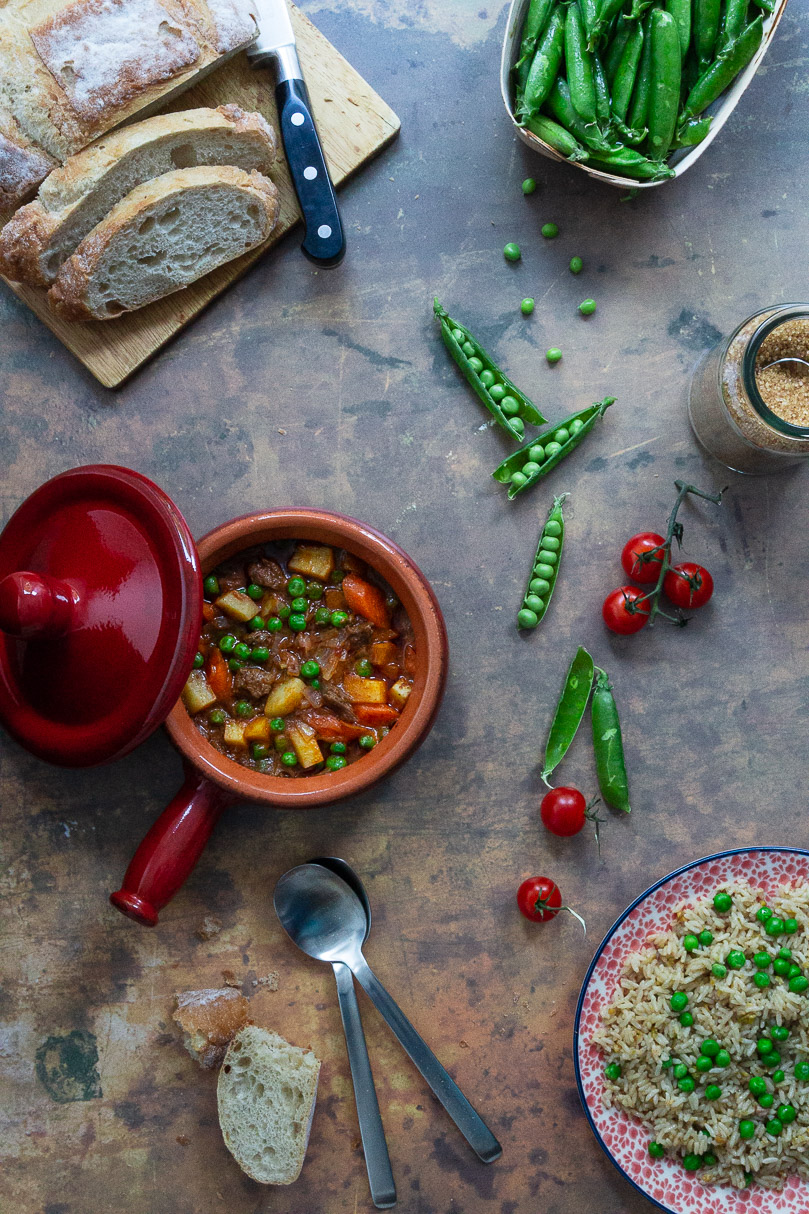 A hearty beef stew with peas, carrots and potatoes