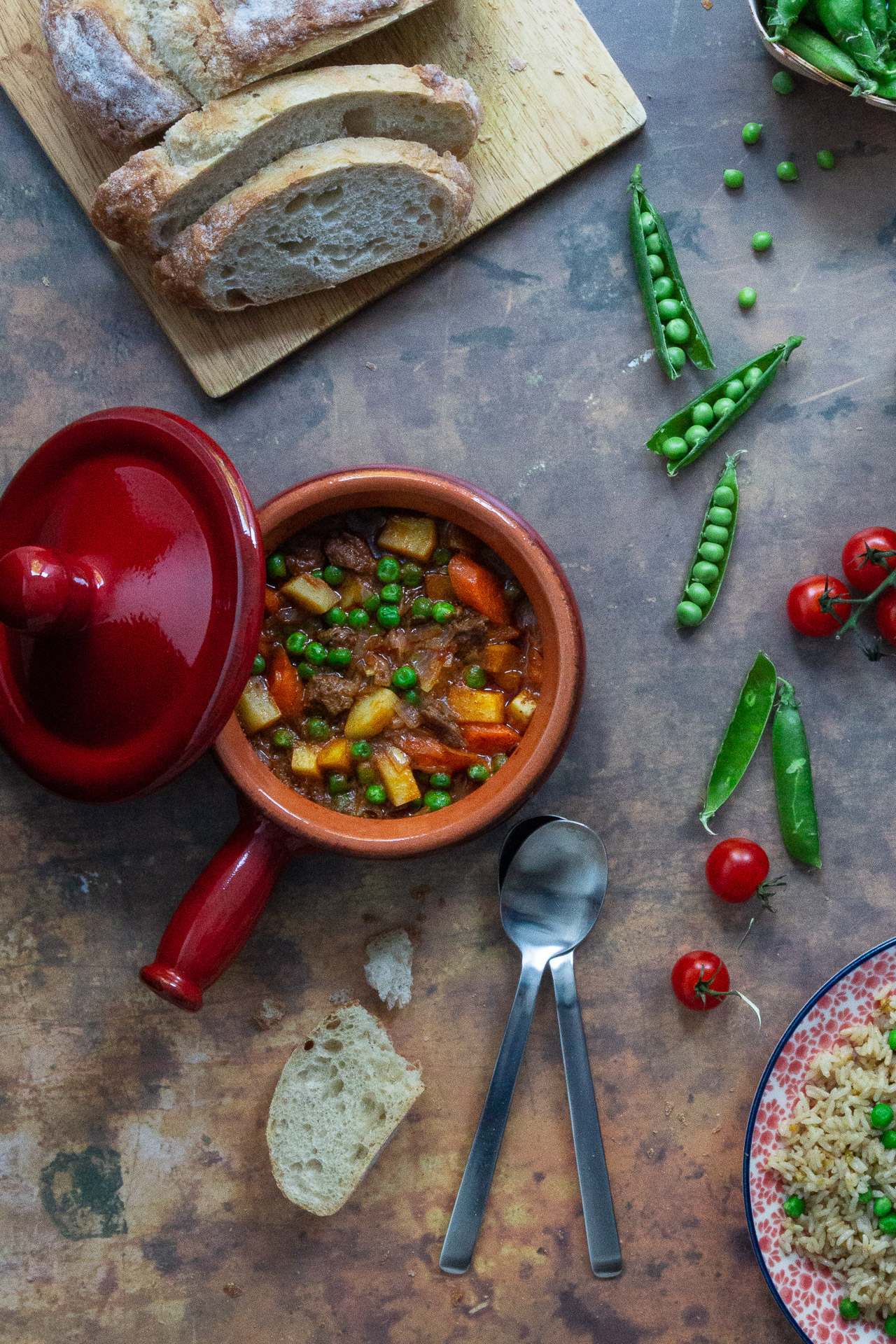 A hearty beef stew with peas, carrots and potatoes